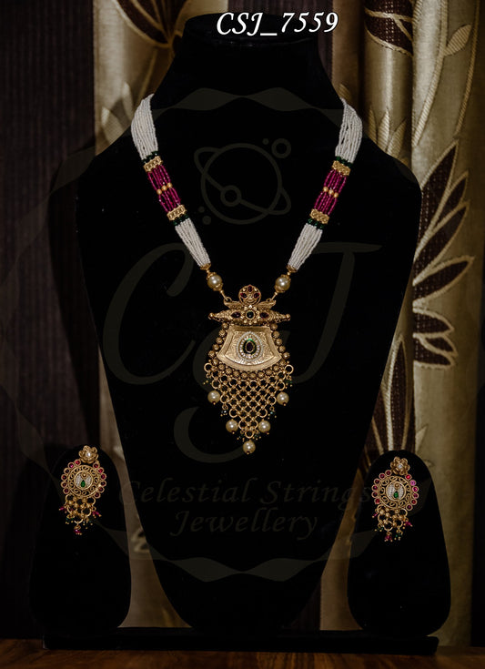 Golden Pendant set with pearl Mala